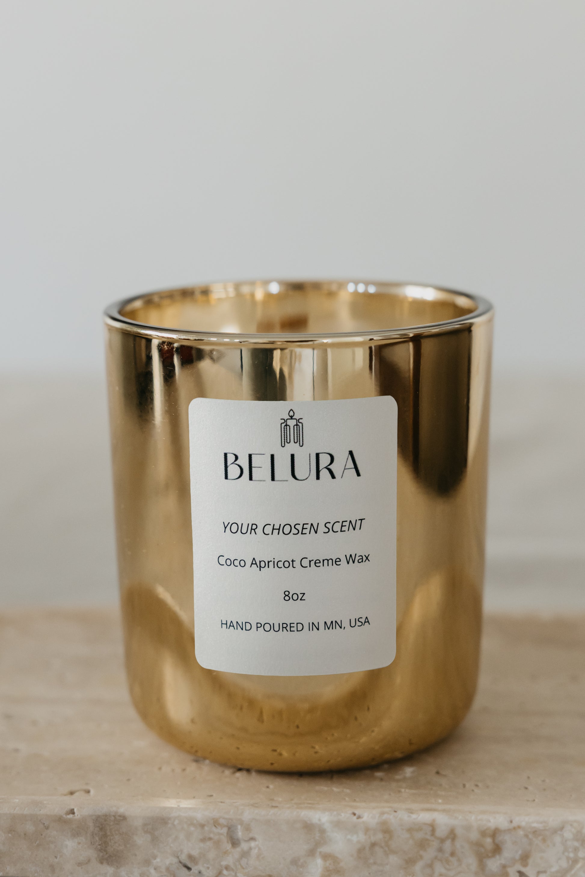Organic candle in lustrous gold jar